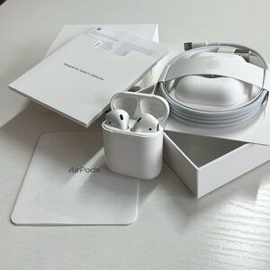 Apple AirPods with Charging Case and Charging Cable
